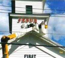 Photo Installing Jesus Saves Sign